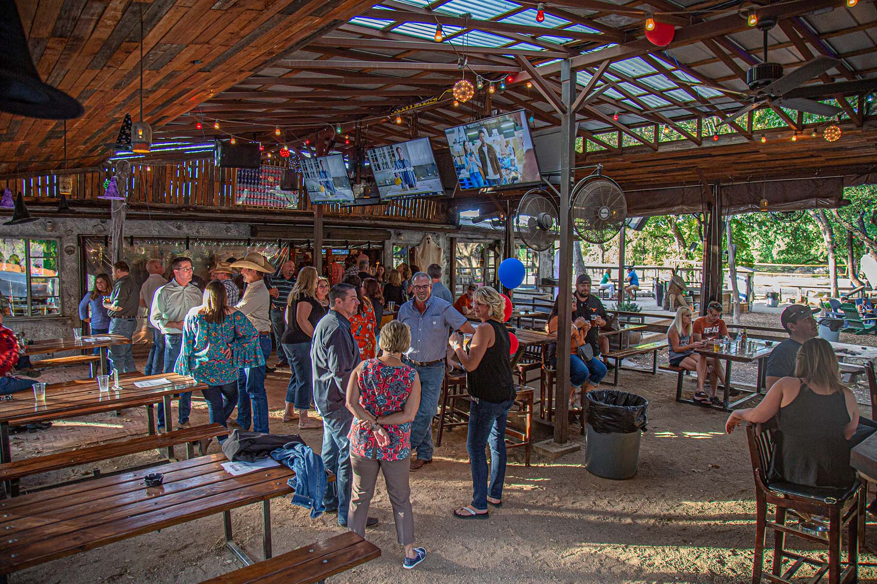 Converted ranch house on 11 big acres with patio bars, volleyball courts, live music. Photo: Will Taylor - LostinAustin.org